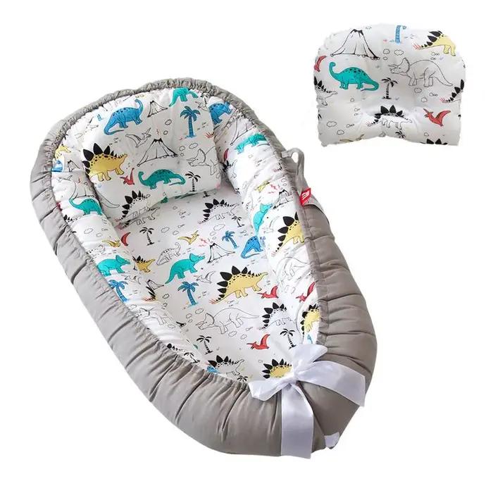 Lit nid de bébé avec oreiller