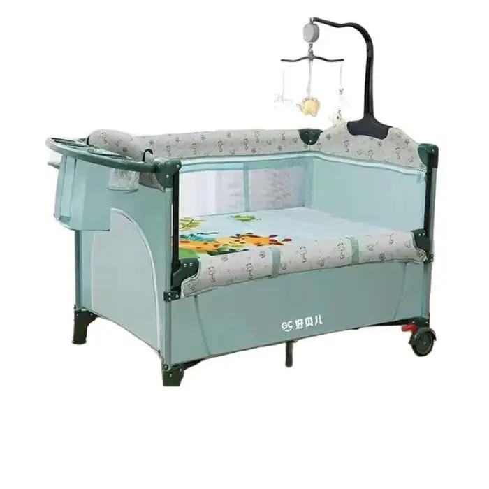Lit bébé pliable 4 en 1 0-3 ans Lit multifonctionnel avec berceau Table à langer pour bébé