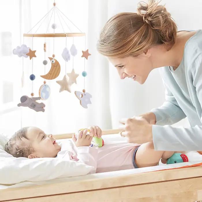 Cloche de berceau en bois pour bébé